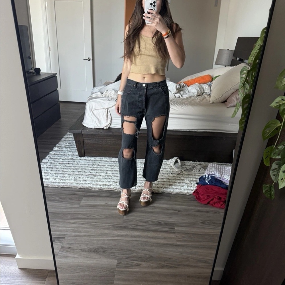 Vintage reworked Levi’s black distressed straight jeans